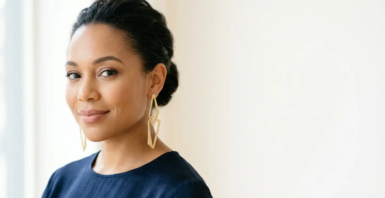 Elegant woman with round face wearing long linear drop earrings