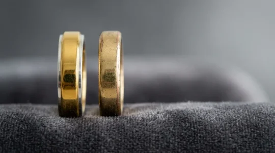 Elegant comparison of gold vermeil and gold plated jewelry pieces showcasing their visual and structural differences