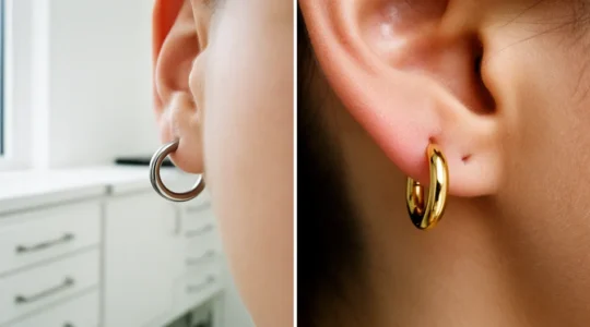 Close-up comparison of titanium and gold sleeper earrings on healed ear piercings
