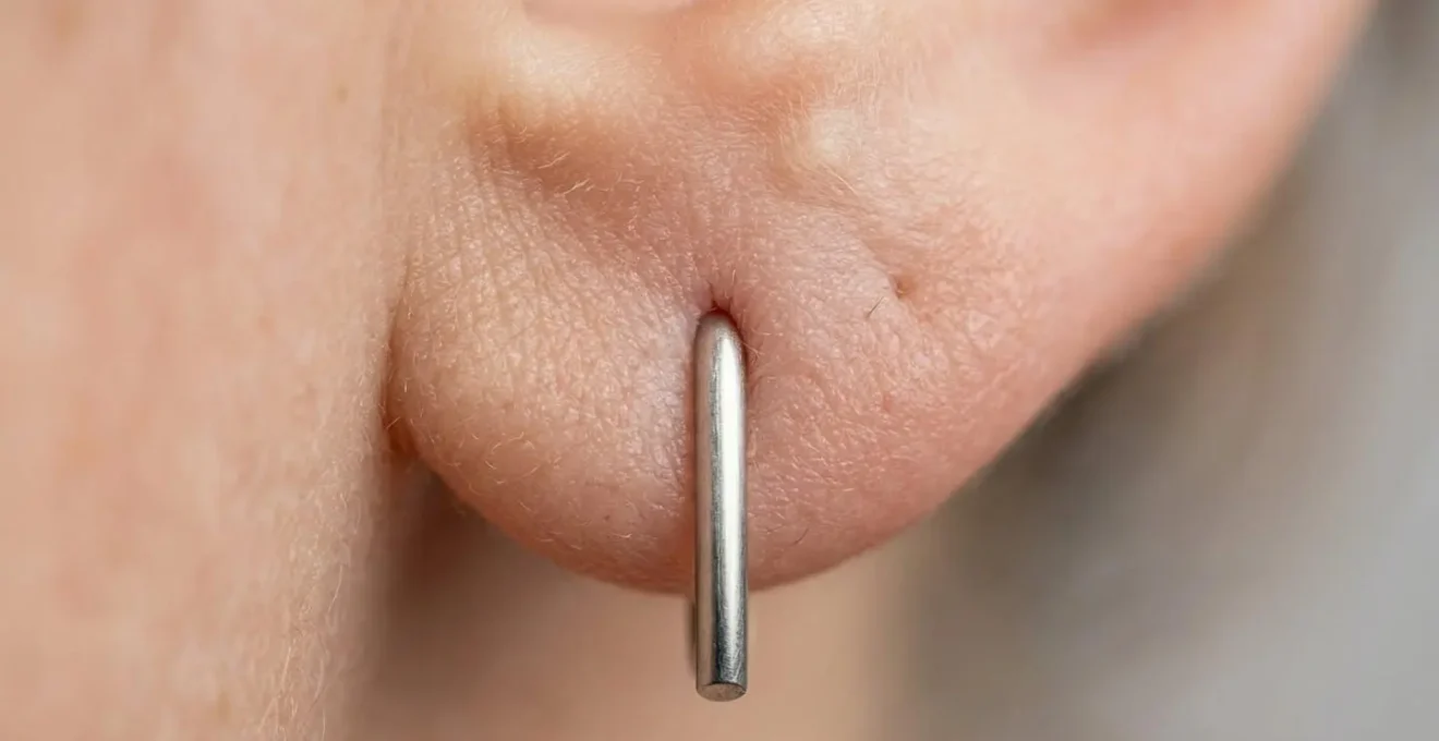 Extreme close-up of earlobe skin showing texture and stress points